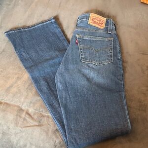 Levi's 725 high-rise boot cut jeans. Size 25 x 34.